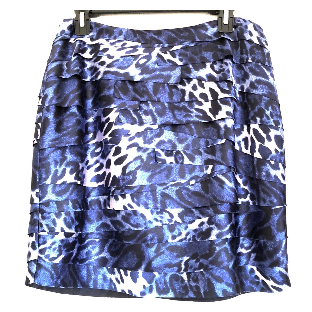 BEBE. Animal print, unique design mini skirt.